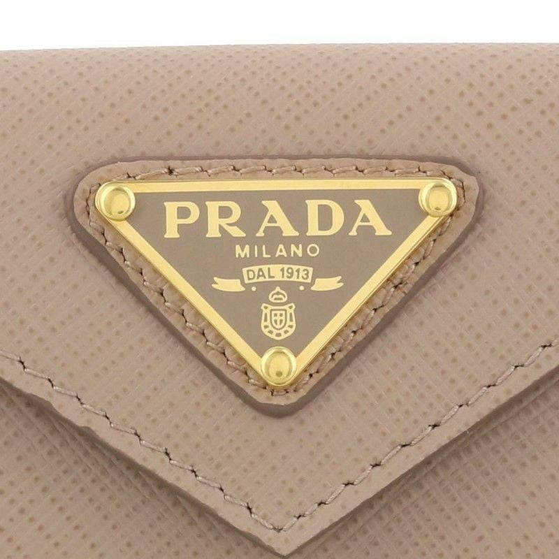 プラダ PRADA 三つ折り財布 SAFFIANO TRIANGOLO ベージュ 1MH021 QHH F0236 CIPRIA